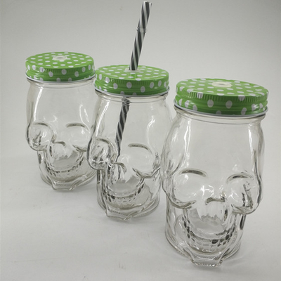 Popular products 17oz custom made glass skulls shaped 510ml mason jar with llid and straw